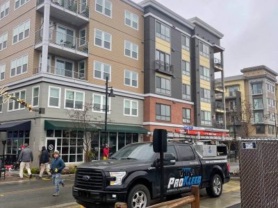 NW ProKleen work truck in front of apartment building